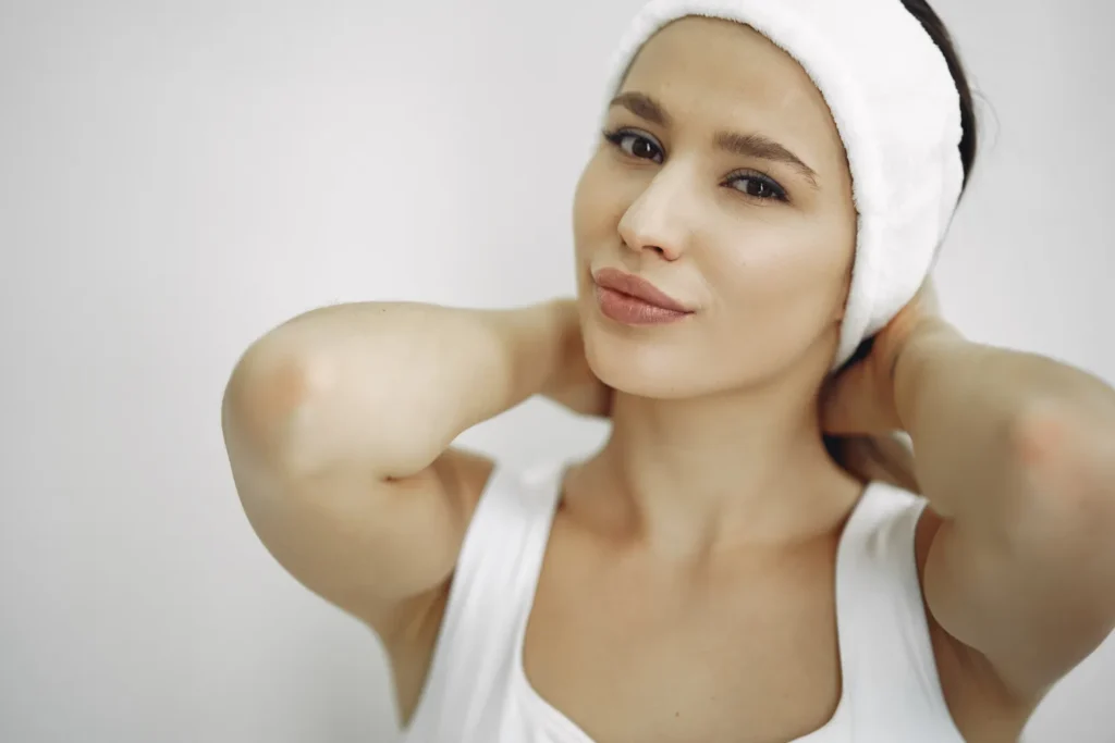 Woman getting prepped for neck liposuction with buccal fat removal
