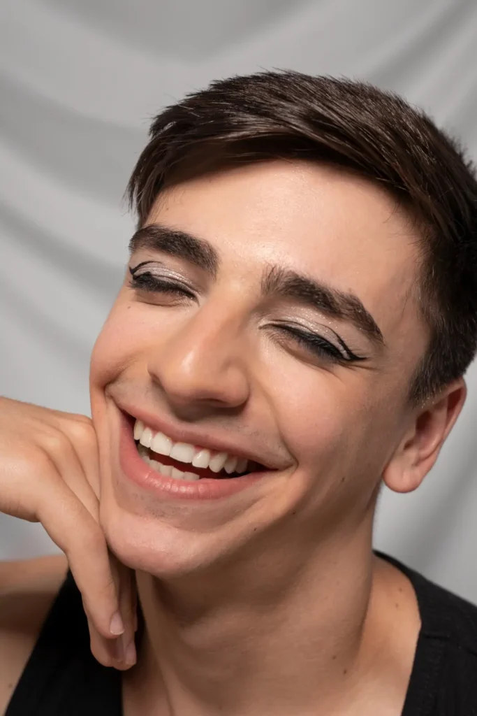 Close up portrait of person wearing make up eye liner