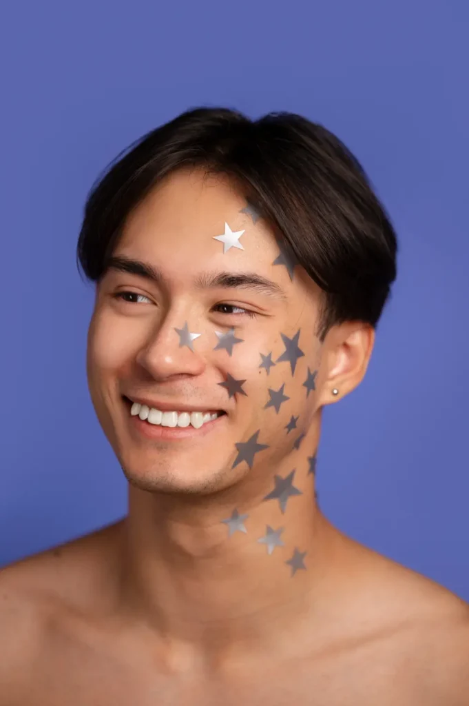 Fun portrait with glued decorations on face