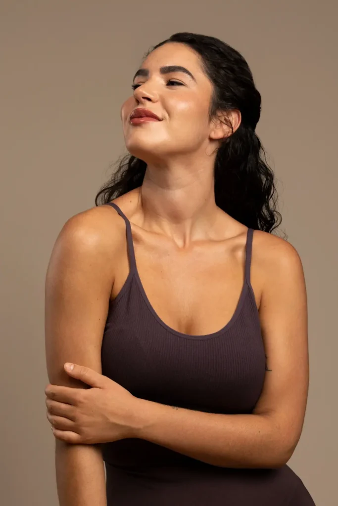 Portrait of woman dressed in shapewear facing left