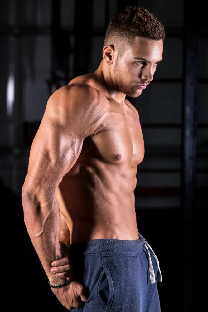 Cool young man posing with fit body