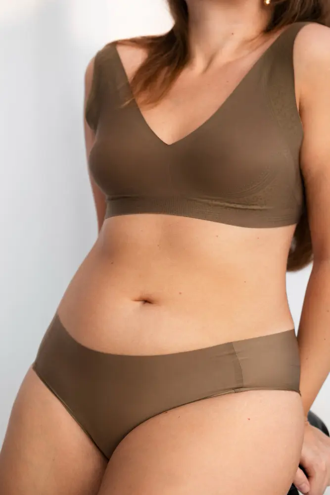 young beautiful plump woman loving her body