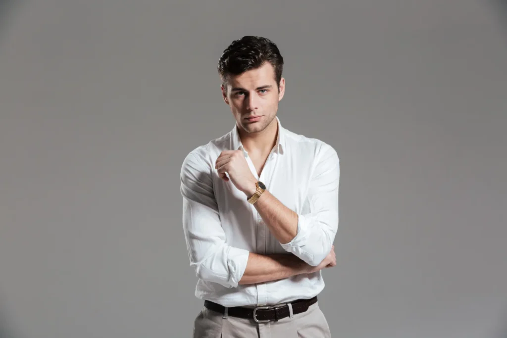 Man flexing his masculine features after getting laser plastic surgery