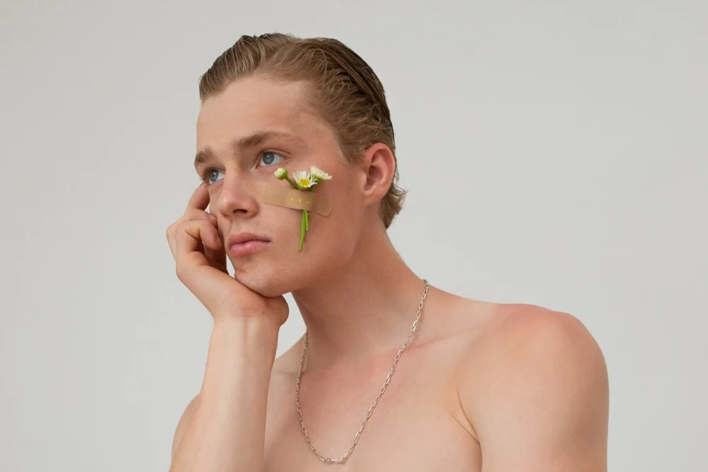 Man thinking of getting the best jawline filler