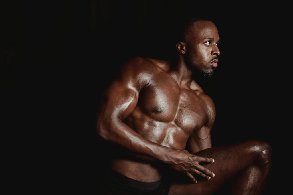 Topless man with well built body after getting a plastic surgery for gynecomastia