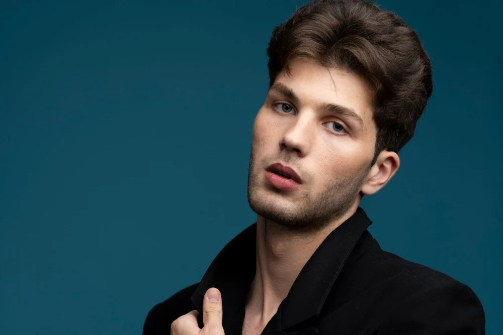 Man with a defined jawline after filler treatment