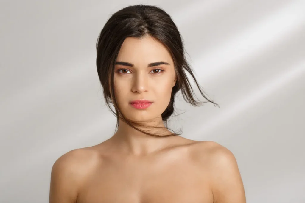 Medium shot of woman after getting FaceTite