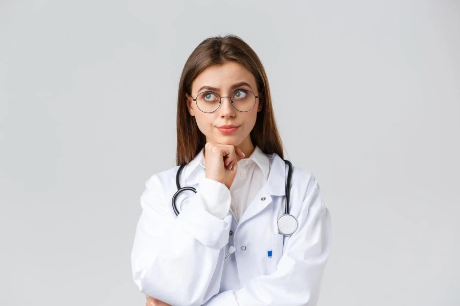 Plastic surgeon thinking about different surgical techniques about plastic surgery