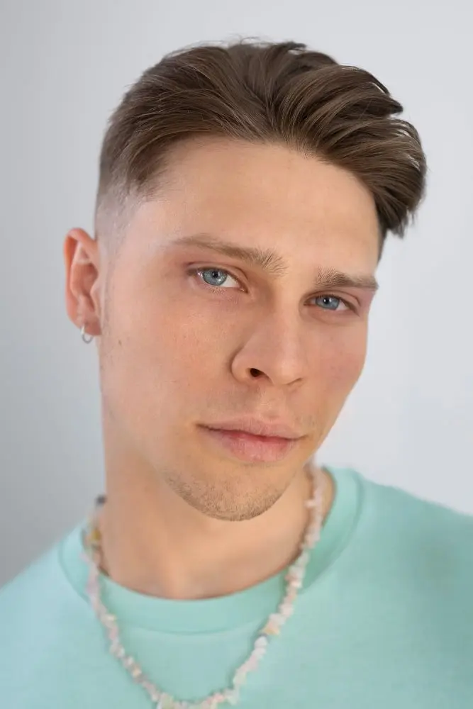 front view young man posing after facetite
