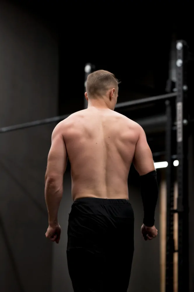 Young man at the gym for weight loss