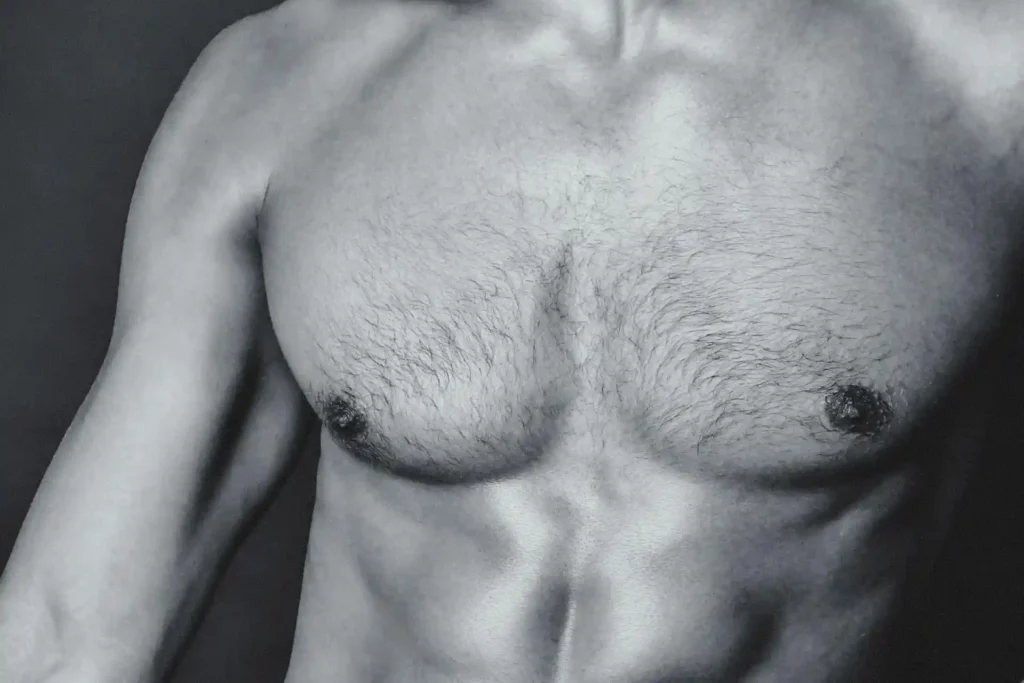 Medium shot of a man's chest after HD liposuction