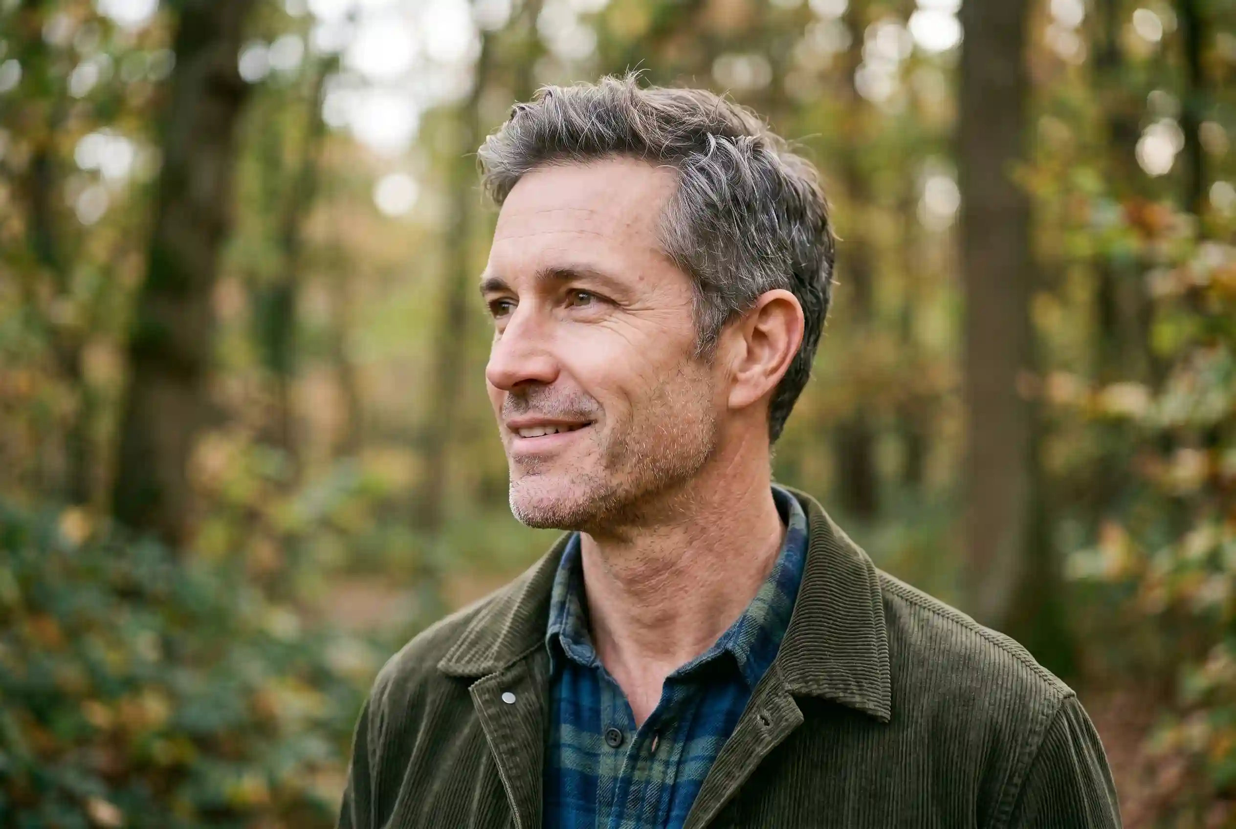 Man with a defined jawline after a non-surgical neck lift