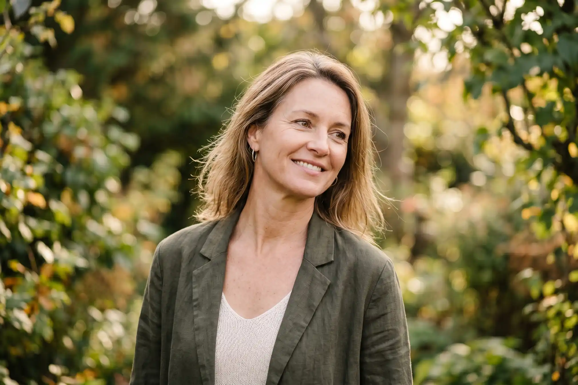 Woman with firm neckline after non-surgical neck tightening