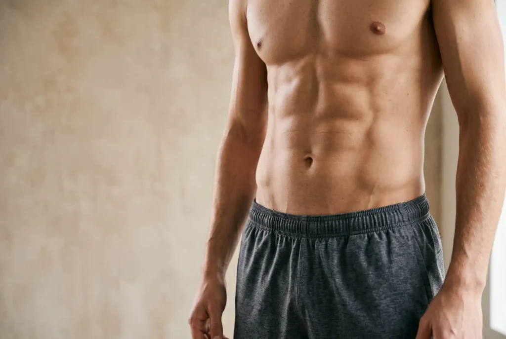 HD liposuction results showing natural athletic ab definition near Dixie Farms