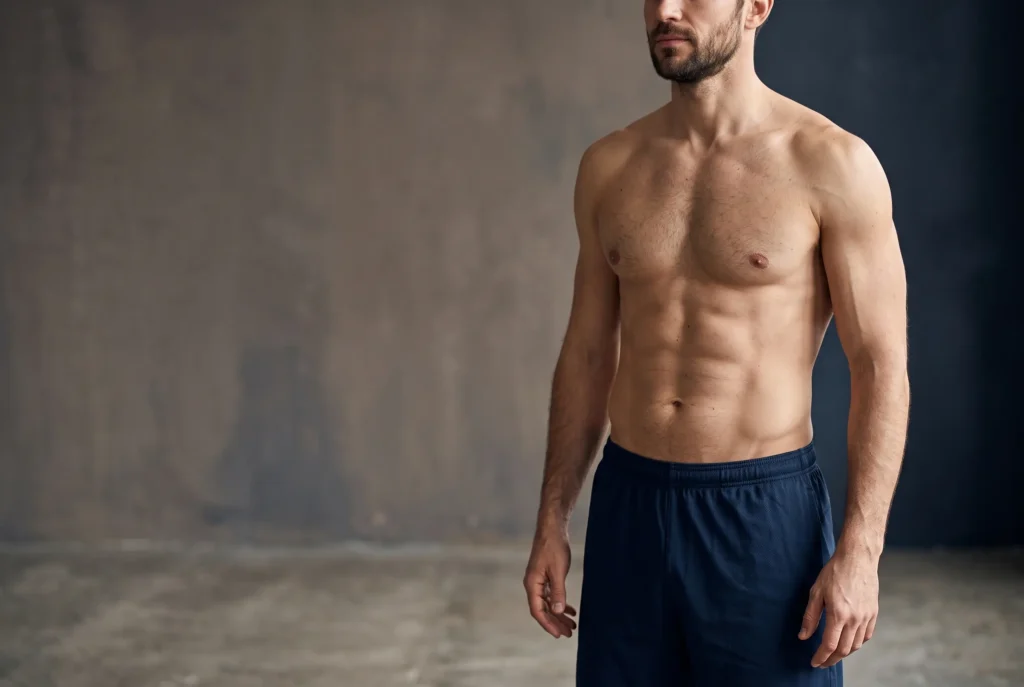 Lean athletic male torso illustrating HD liposuction results in Golf View, Tampa