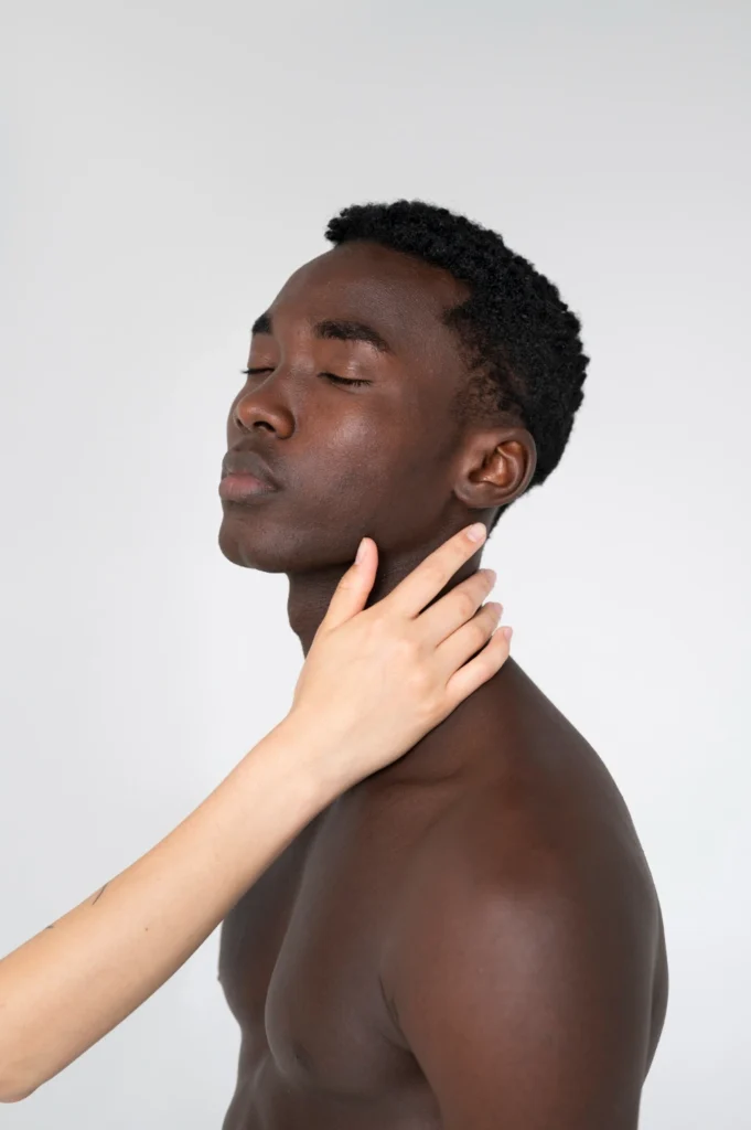 Side view man posing in studio