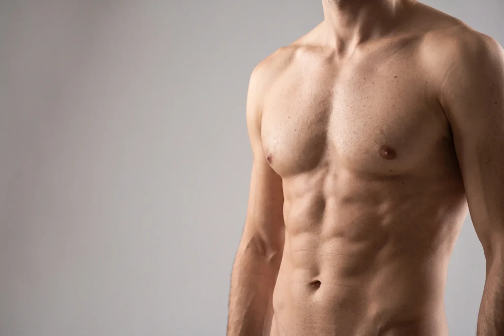 Lean athletic male torso with natural definition, HD liposuction in East Tampa