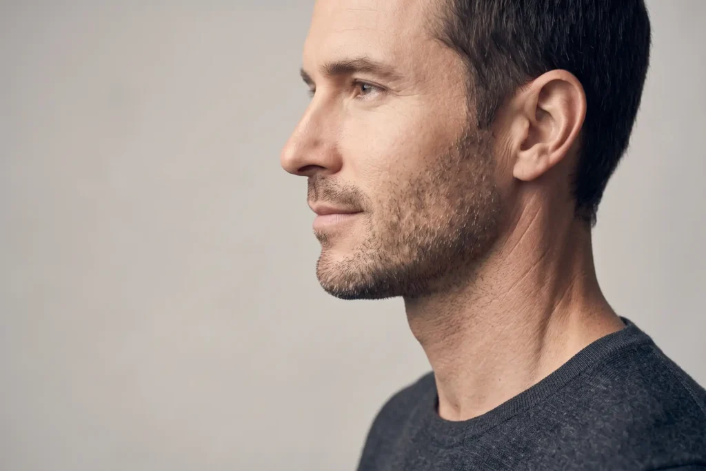 Man with a defined jawline near Eastern Heights, neck and jawline contouring in Tampa