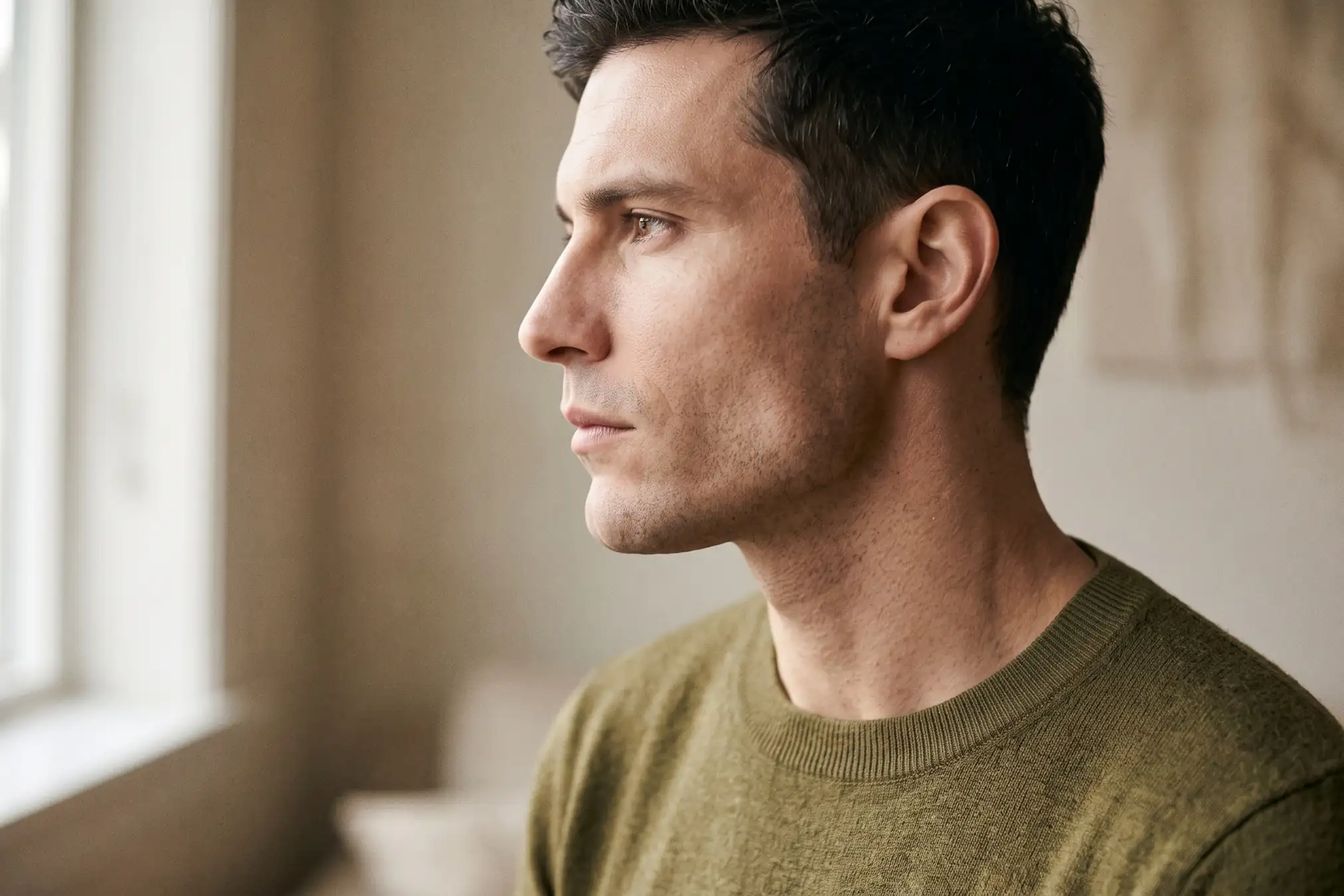 Adult side profile showing a defined jaw and chin, the frame jawline filler addresses