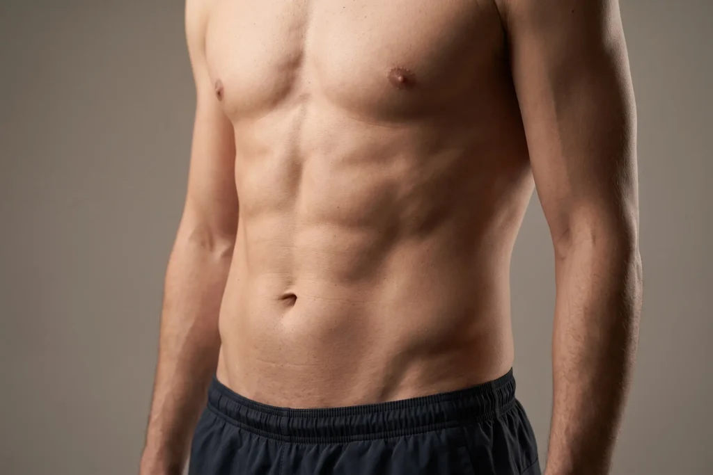 HD liposuction result for a Ruskin patient showing natural athletic torso definition