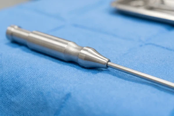 Close-up of a liposuction cannula used in energy-assisted techniques