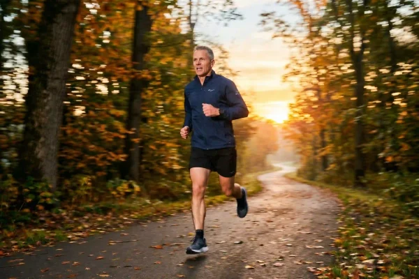 Man exercising months before tummy tuck surgery to reach a stable weight