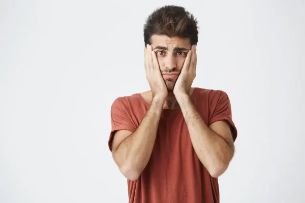 Man looking nervous after discovering thread lifts can go wrong