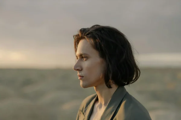 Side profile of a man after getting a non-invasive jawline procedure