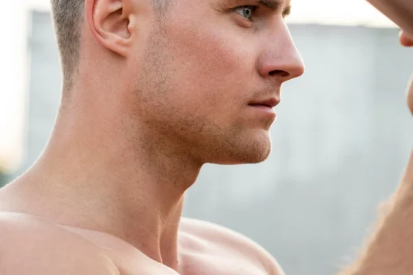 Side profile of a man showcasing results of his neck tightening procedure