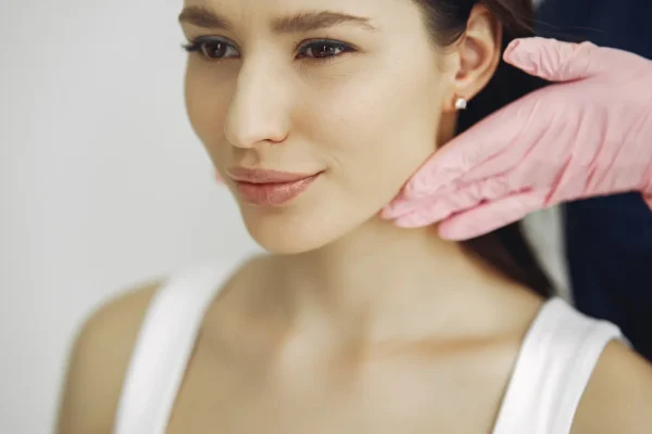 Woman getting examined before getting PDO threads