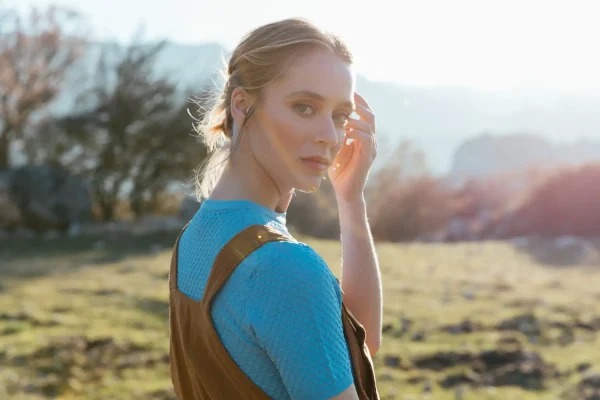 Woman in her 20s enjoying the results of her preventative Botox