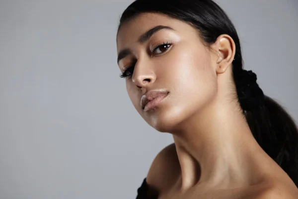 Woman showing her beautiful jawline after getting fillers