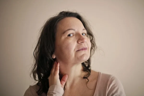Woman thinking of getting a PRP treatment for her sagging skin and jowls