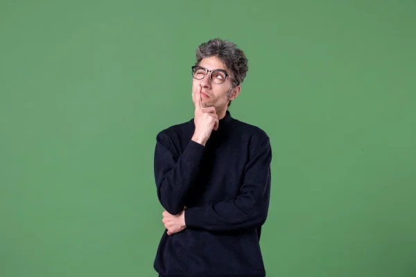 Man thinking if he should get a neck and jawline contouring