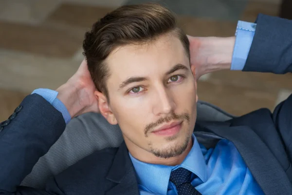 Close-up shot of a man with combined face lipo and FaceTite