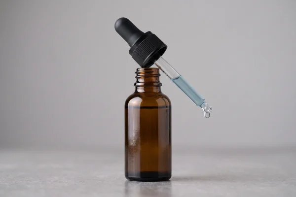 Copper peptide serum dropper bottle representing topical GHK-Cu safety