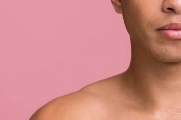 Cropped photo of a man after recovering from a neck tightening procedure