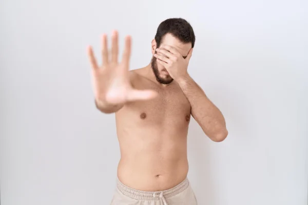 Man getting scared about some issues after getting liposuction