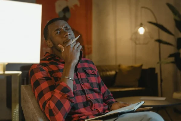 Man thinking if about how to maintain liposuction results