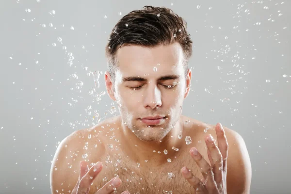 Man with wet face 24 hours after Botox injection