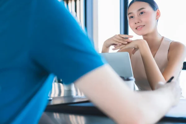 Woman discussing possible options to treat her cellulites with a cosmetic surgeon