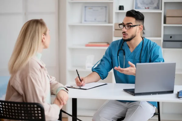 Doctor discussing the benefits of CJC-1295 peptide therapy