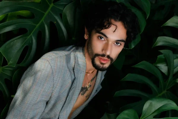 Handsome man with defined neck and jawline after getting injected with fillers
