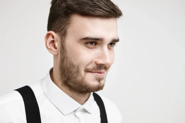 Man showing his handsome face after PDO thread lift procedure
