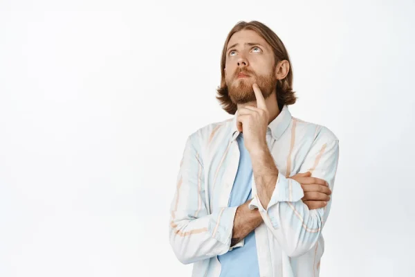 Man thinking about jawline filler migration