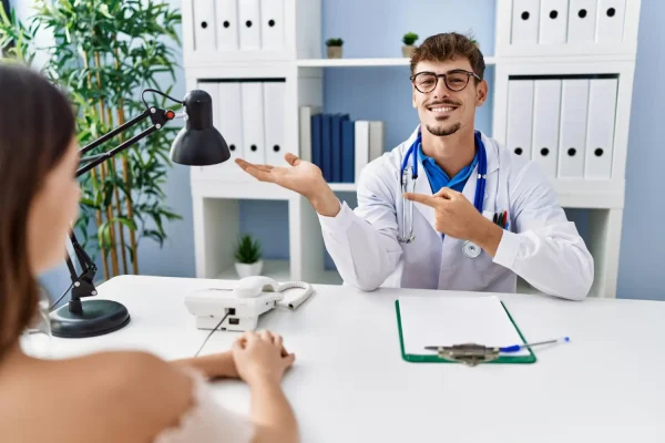 Patient consulting a cosmetic surgeon about smart lipo