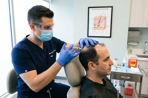 Physician assistant performing a PRP scalp injection at Formation in Tampa