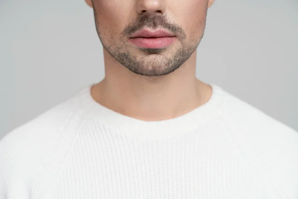 Close-up of man's lower face, chin, and neck area comparing Botox results to alternative double chin treatments