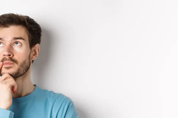 Man with thoughtful expression considering how tirzepatide works for weight loss.