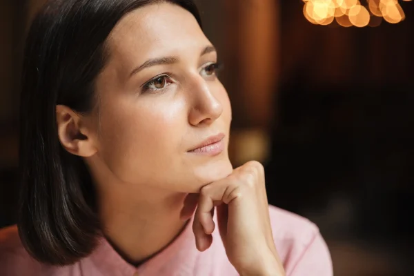 Profile view of woman with refined jawline showing results achievable through neck liposuction